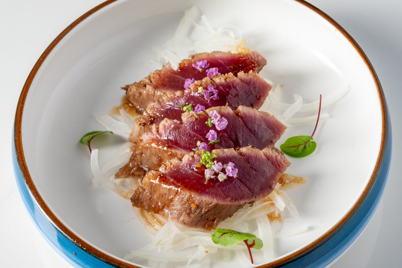 Ahi Tuna Tataki seared and thinly sliced with citrus - East Moon Centennial CO