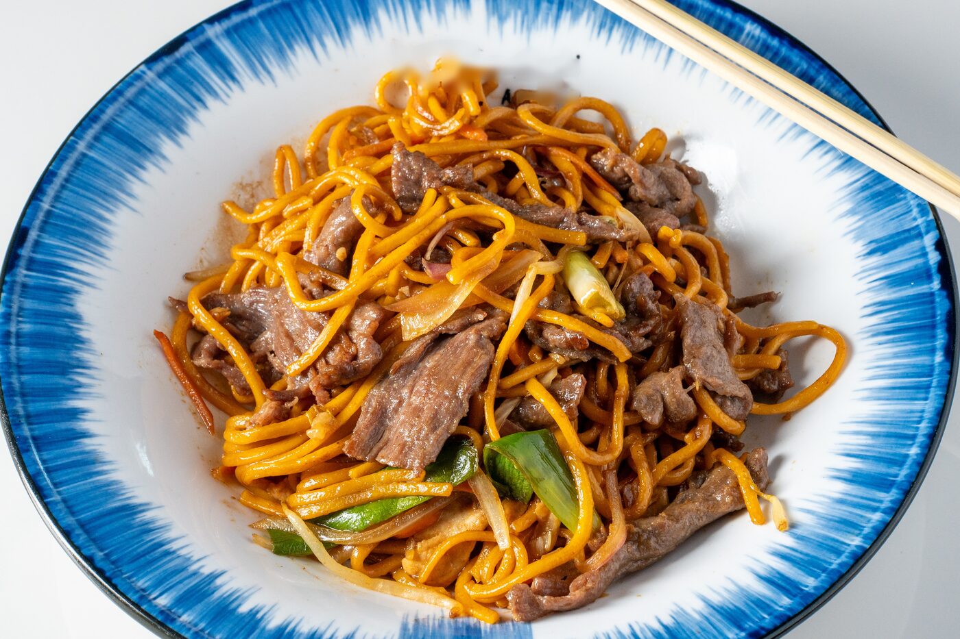 Beef Lo Mein stir-fried egg noodles with scallions - East Moon Centennial CO