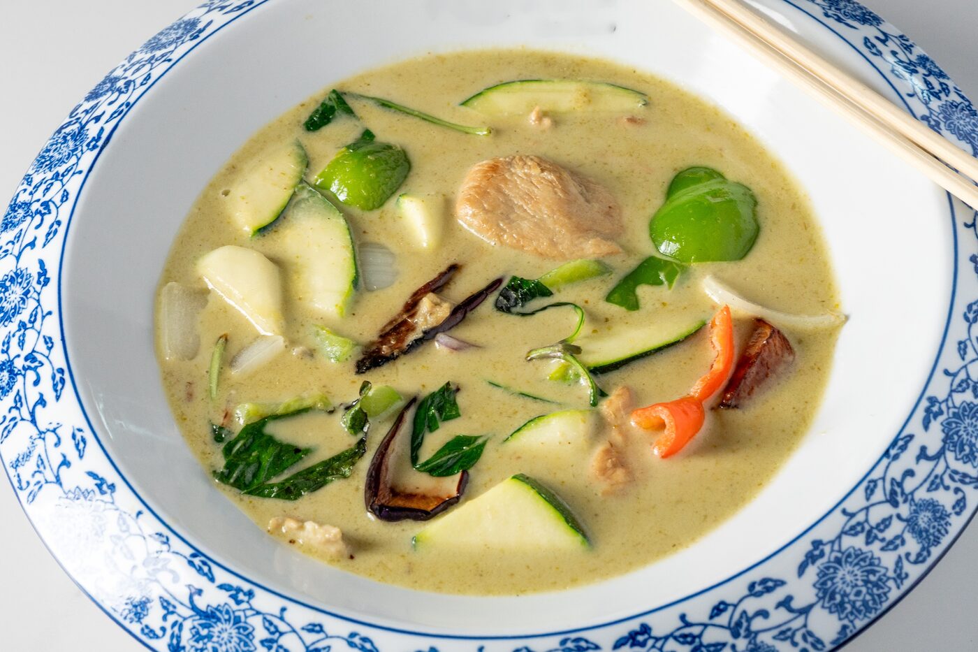 Thai Green Curry with coconut milk, zucchini and basil - East Moon Centennial CO
