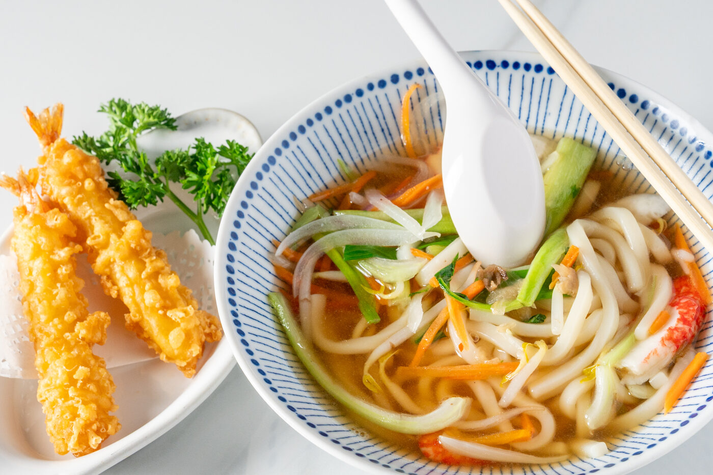 Tempura Udon noodle soup with crispy shrimp tempura - East Moon Centennial CO