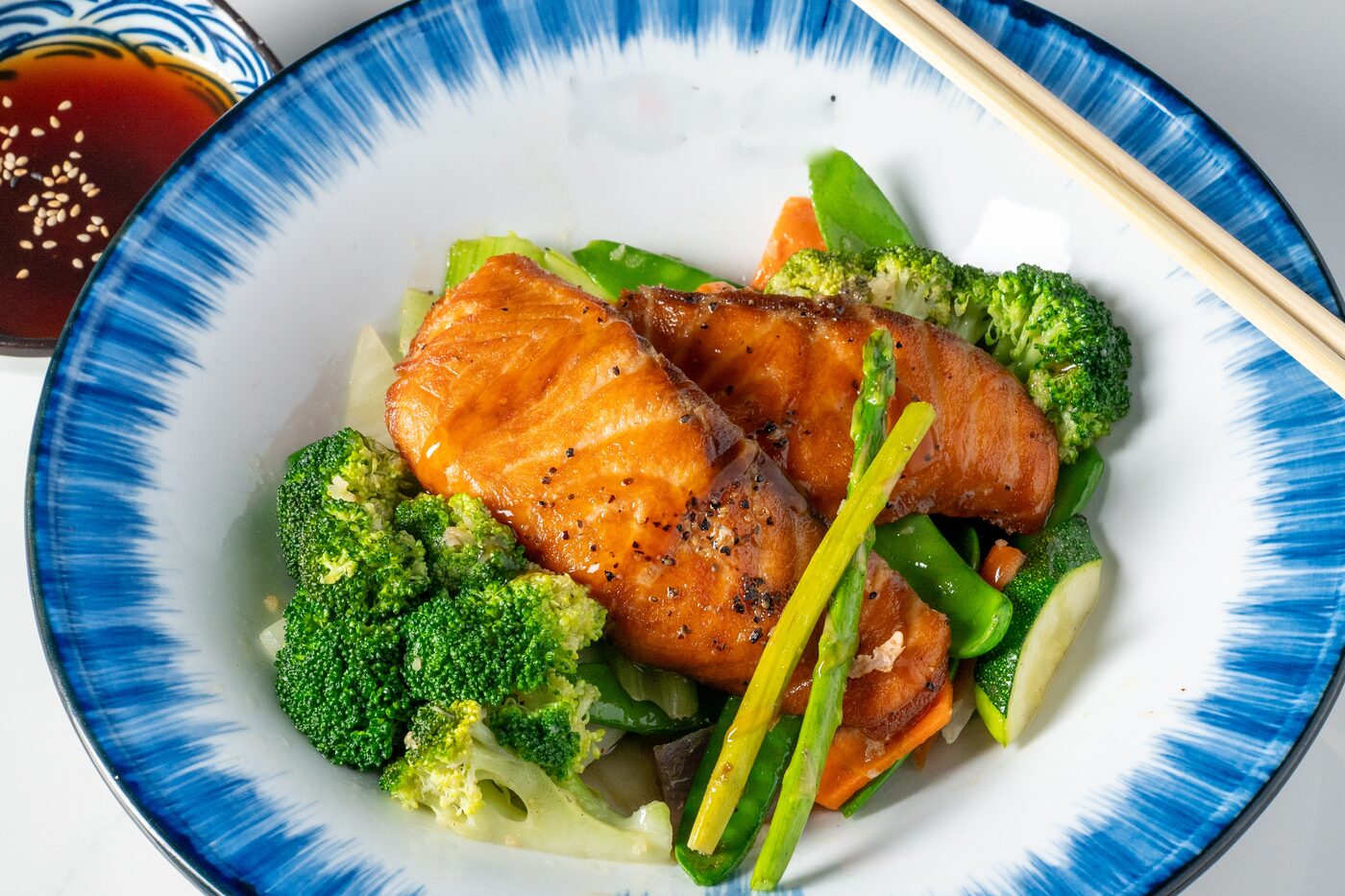 Salmon Bento entree with teriyaki glazed salmon and broccoli - East Moon Centennial CO