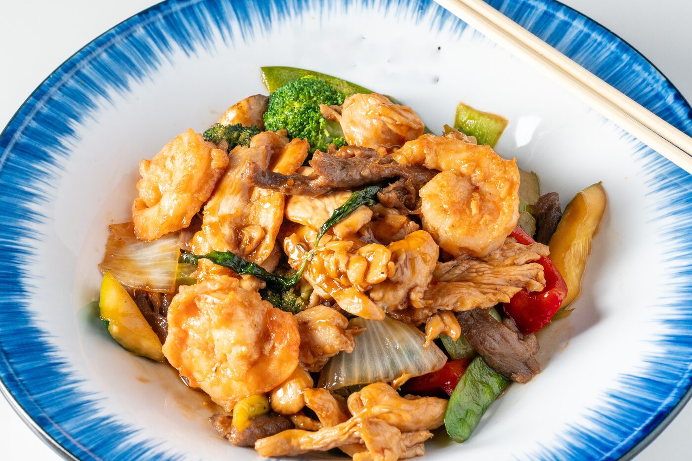 Thai Basil Combination with chicken, beef and shrimp - East Moon Centennial