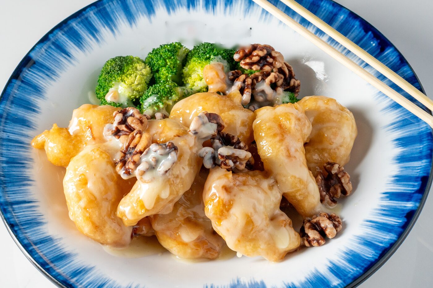 Honey Walnut Shrimp with candied walnuts and broccoli - East Moon Centennial CO