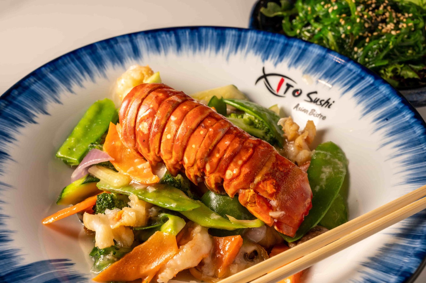 East Moon Seafood with whole lobster tail, shrimp and scallops wok tossed with snow peas and broccoli - East Moon Centennial CO