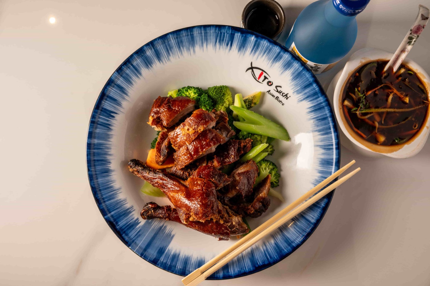 Thai Sweet Basil Duck roast duck stir fried with broccoli and sweet basil - East Moon Asian Bistro Centennial CO